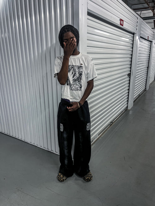 “torn” sweats